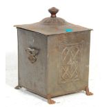 A 19th Century Victorian metal coal scuttle of rectangular form having embossed decoration panels to