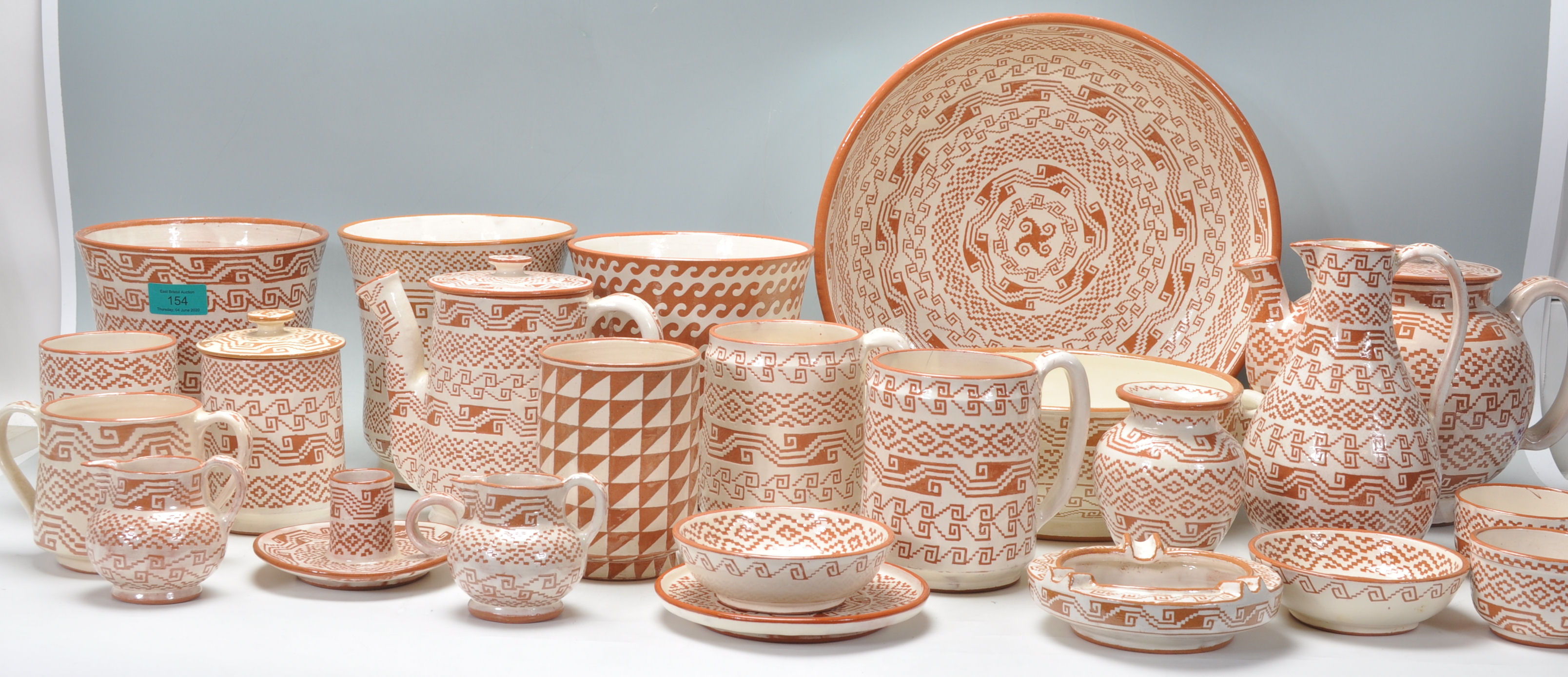 A beautiful and large collection of 20th century Mexican Mitla hand made studio pottery being made