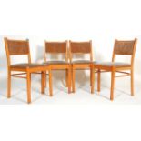 A set of four vintage retro 1980's Schreiber dining chairs having padded brown velvet upholstered