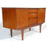 A vintage retro 20th Century Danish inspired teak wood sideboard credenza of small proportipons