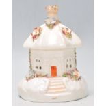 A 19th Century Victorian Staffordshire pastille burner in the form of a cottage encrusted with
