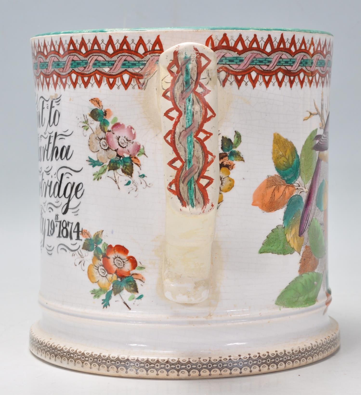 A 19th century Victorian Staffordshire twin handled marriage loving cup - mug being cream glazed - Image 2 of 7