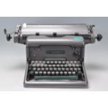 An early 20th Century vintage industrial manual typewriter by Imperial, having an A3 roller and