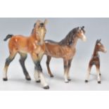 A group of three Beswick ceramic horse figurines t