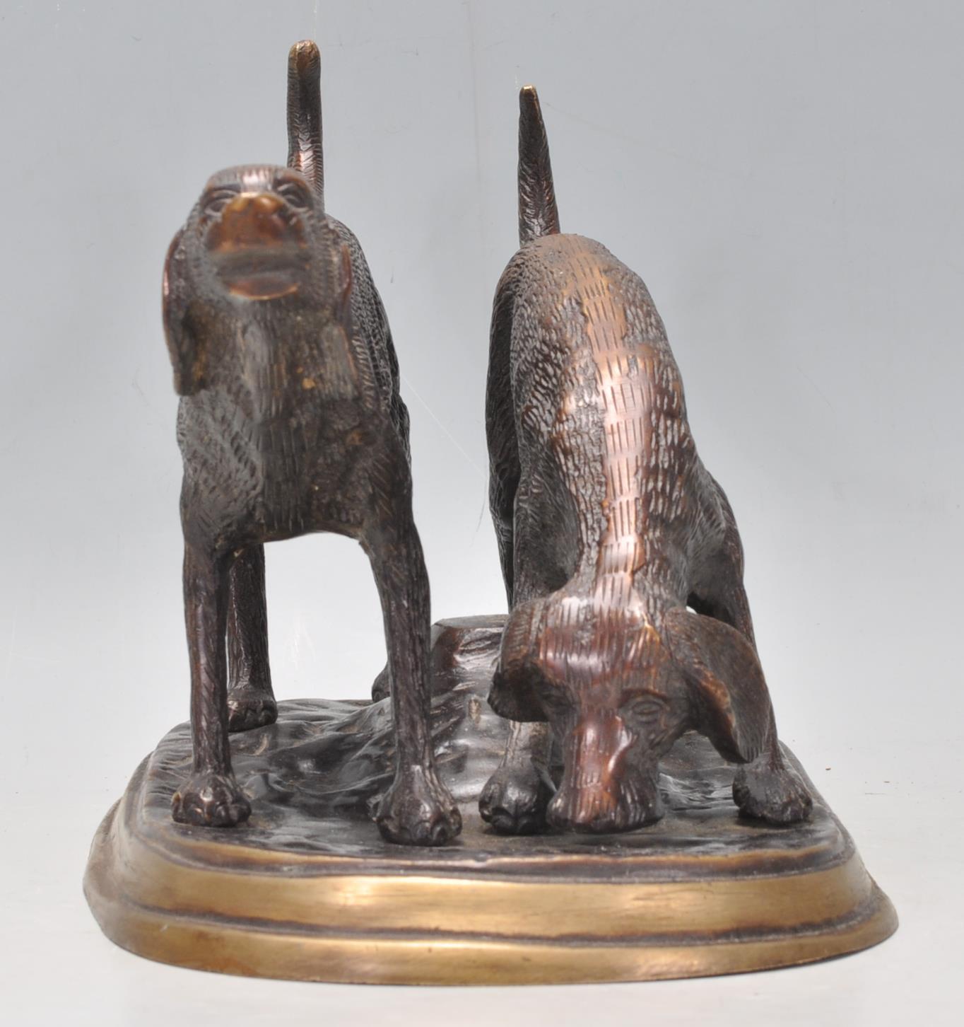 A vintage 20th Century bronze figure depicting a two hunting dogs. Raised on a rounded base. - Image 2 of 7