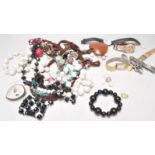 A mixed group of vintage costume jewellery to include faux jet and pearl necklace examples with