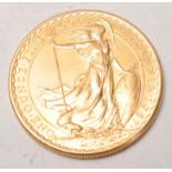 A One Ounce Fine Gold 22ct gold Britannia 100 pound coin dated for 1987 Queen Elizabeth II. Weighs