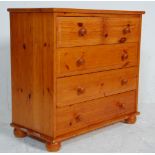 A contemporary 20th century antique revival country pine chest of drawers having two short of