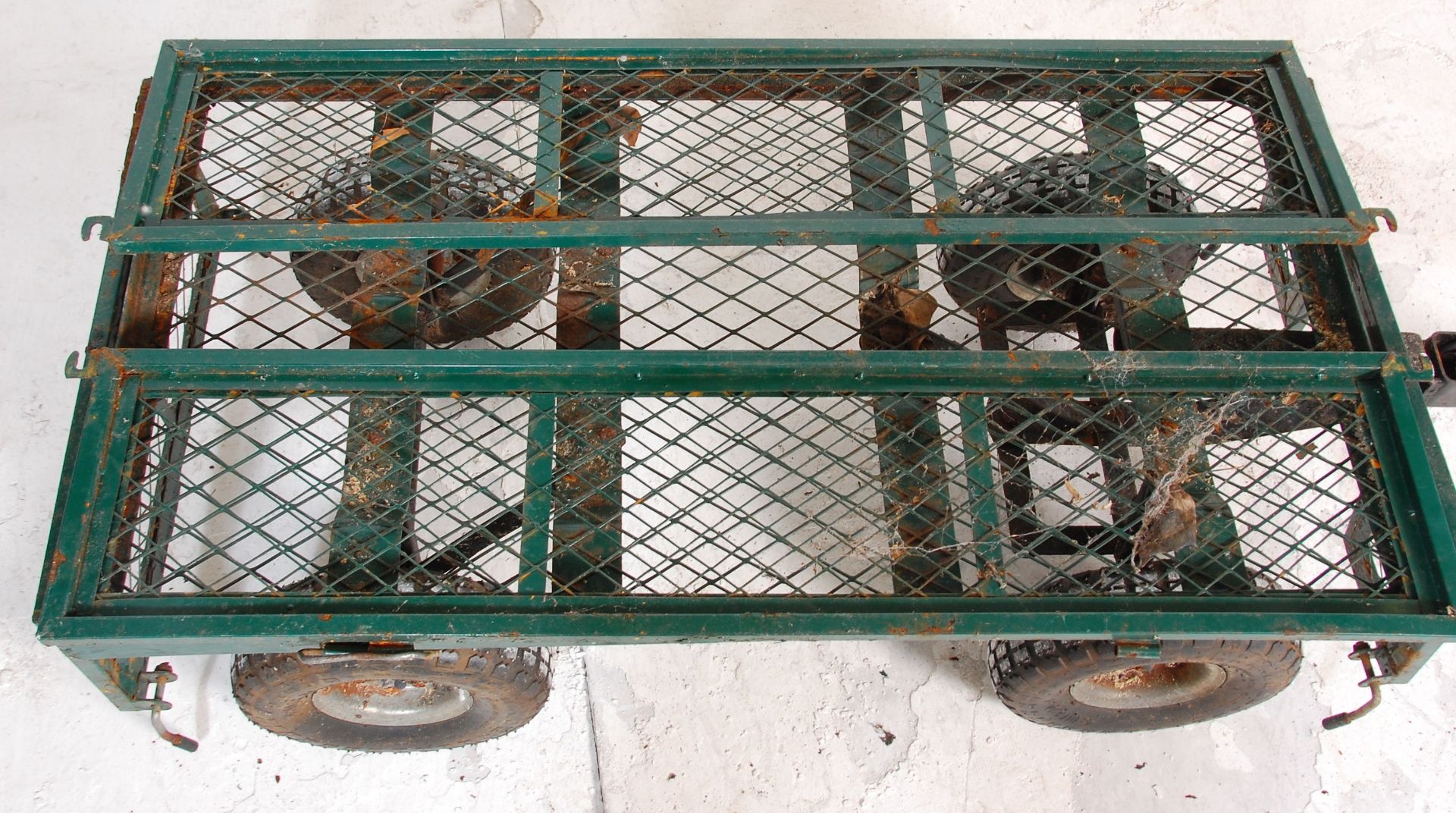 A metal four wheel pull along trolley finished in green with fold down sides. 85cm x 105cm x 55cm. - Bild 9 aus 10