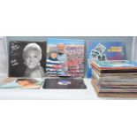 A collection of vintage 12" LP records to include a good selection of film and musical scores