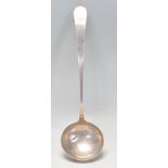 An American silver ladle having a monogram handle and stamped to verso for Wishart. Makers mark