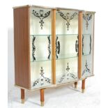 A good retro mid Century, circa 1950's formica china display cabinet vitrine. Raised on tapering