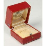 A vintage ladies red leather and gilt tooled ring box. Printed to the silk interior 'Hardy Bros.