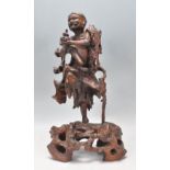 A good early 20th Century Chinese well carved figu