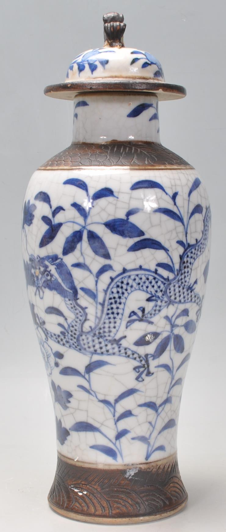 A late 19th Century Chinese blue and white lidded crackle glaze baluster vase having hand painted - Image 4 of 8