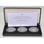 A boxed set of Jubilee Mint The Life and Times of Her Majesty the Queen Solid Gold Coin