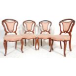 A good set of four 19th Century Victorian mahogany balloon back dining chairs having pink