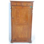 A 19th century Arts & Crafts oak  students / bachelors wardrobe chest combination having two small