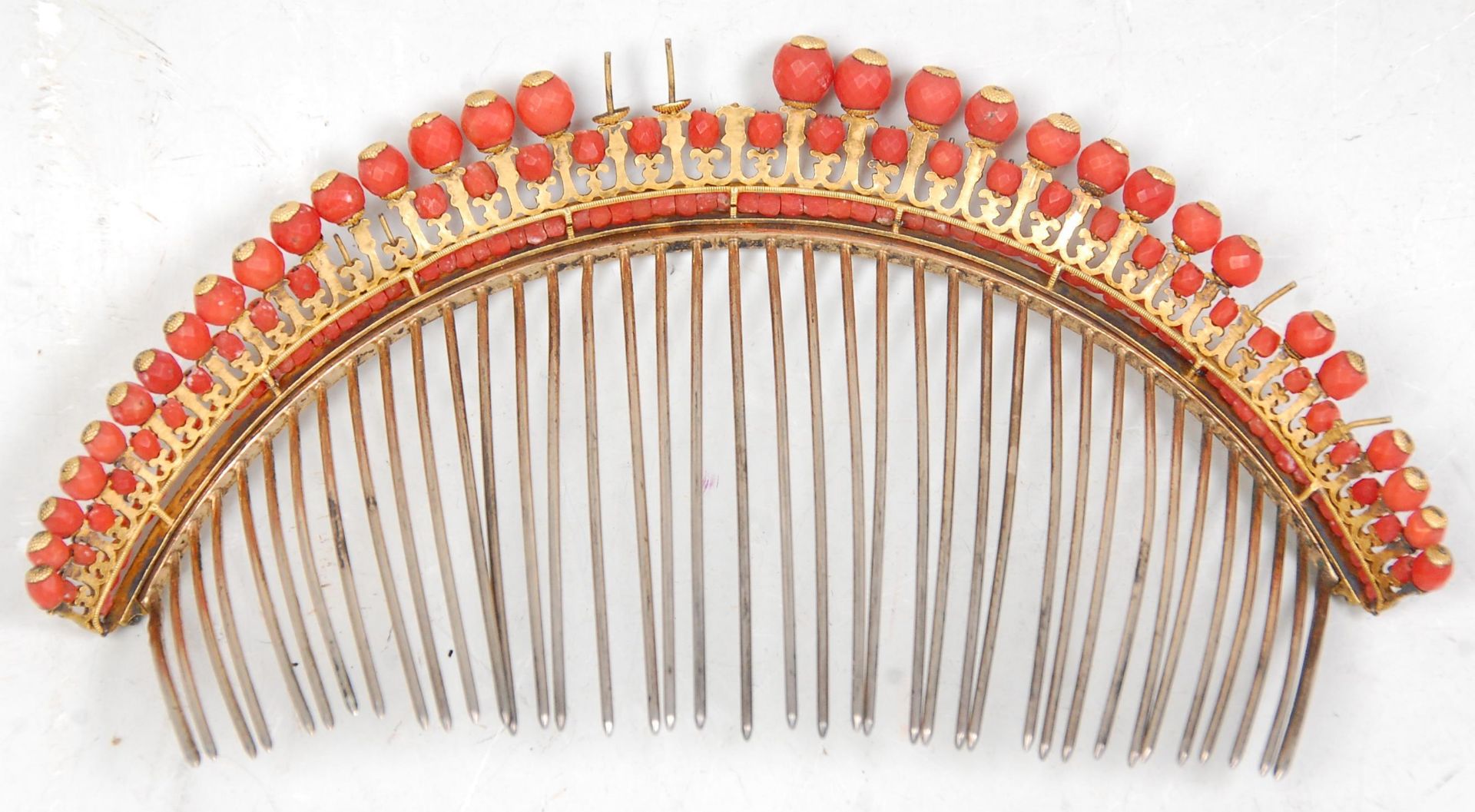A 19th Century Victorian gilt silver tiara set with faceted coral beads mounted on prongs with