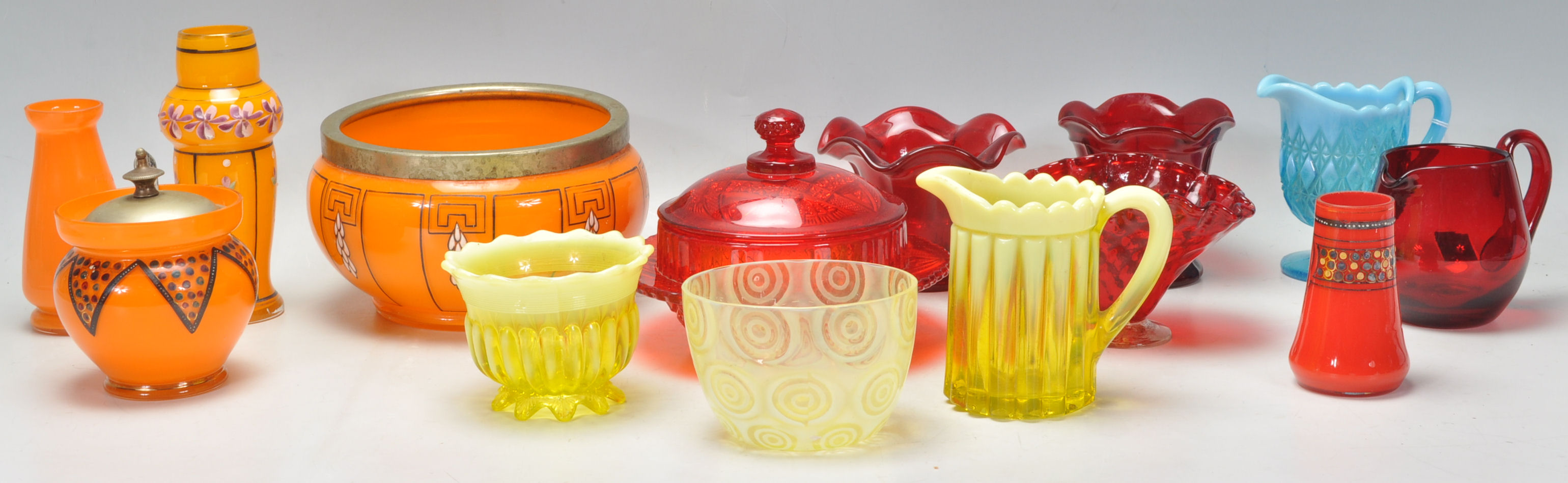 A good mixed group of coloured glassware dating from the 19th Century with some having hand