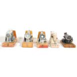 A group of five vintage retro cased sewing machines to include a Hillman machine, Jones example,