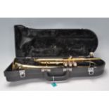 A vintage American Conn brass trumpet with mouthpiece and within original fitted case. Model