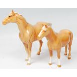 A collection of 2 Beswick horse porcelain figurine