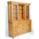 A large Jaycee / Old charm oak drinks cabinet sideboard. The base with short drawers and cupboards