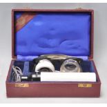 A set of vintage Keeler optometrist 20x magnifying eye glasses complete in their original case