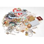 A collection of vintage costume jewellery to include a good selection of mid Century brooches, a