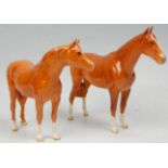 A  collection of Beswick horse porcelain figurines to include 2 light brown bay coloured horses,