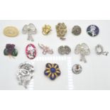 A collection of 15 various brooches - costume jewellery dating to the 20th century to include silver