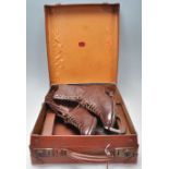 A good pair of vintage 20th Century brown leather ice skates having Sheffield made blades. The