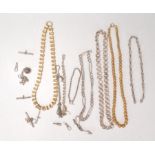 A collection of vintage necklace and watch chains to include a gilt filigree bead necklace, a silver