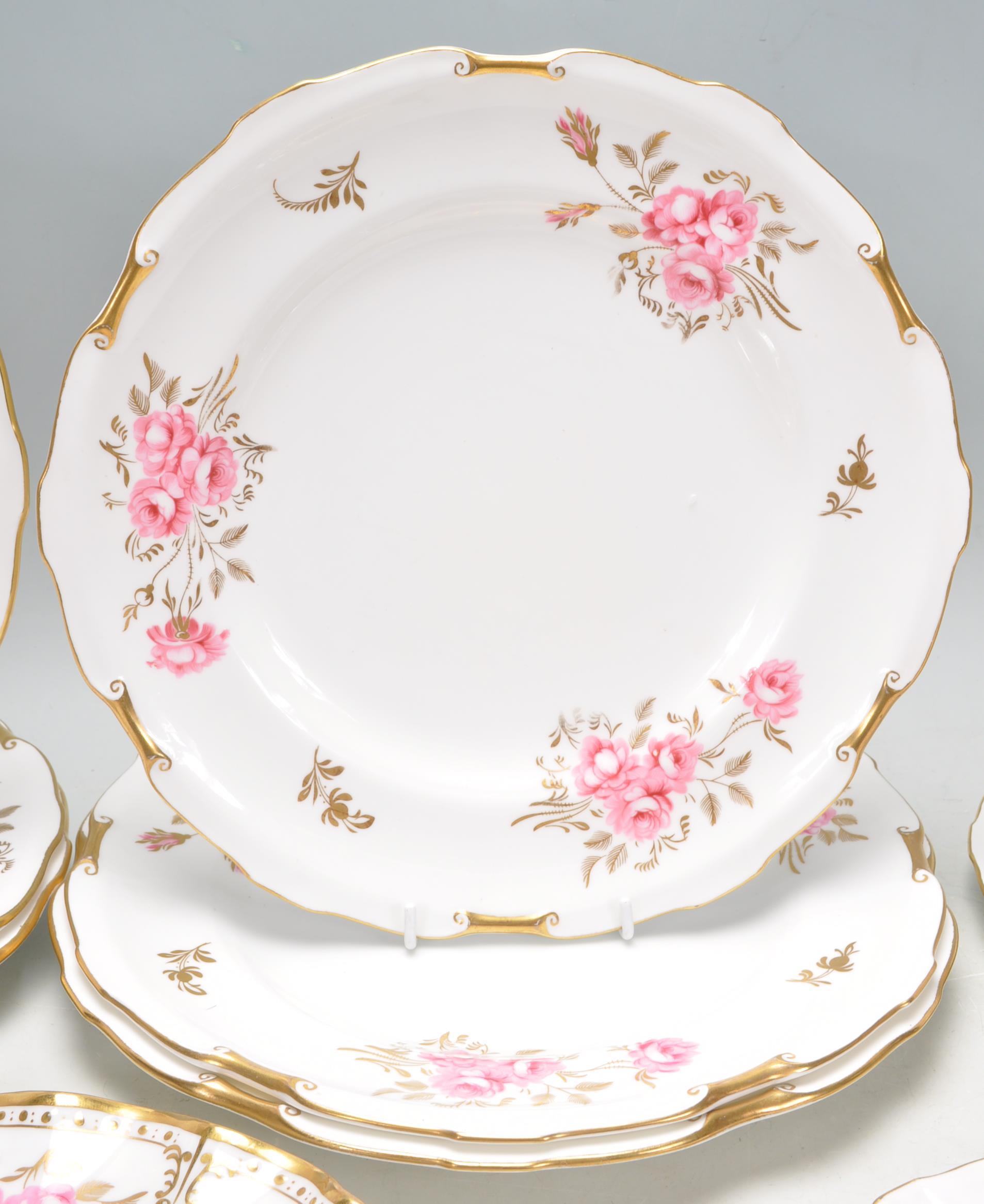 A group of Fine Bone English China plates by Royal Crown Derby in Pinxton Roses pattern with hand - Image 3 of 9