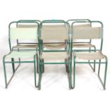 A group of six vintage retro 20th Century industrial tubular chairs having green canvas seats and