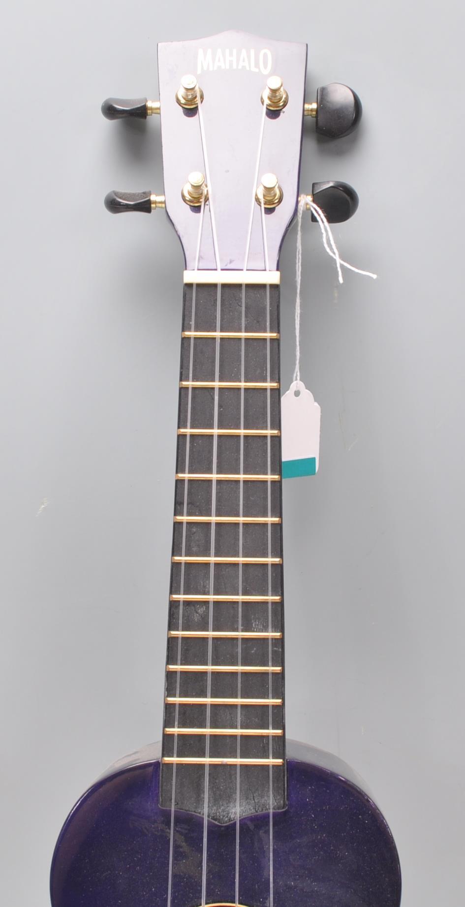 A good Mahalo made four string ukulele finished in blue. 52cm long. - Image 3 of 9