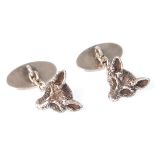 Hunting Interest. A pair of silver gentleman's cufflinks in the form of foxes heads. Each fox head