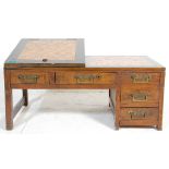 A 19th Century Korean scholars low desk / table having a panelled geometric veneered top with a