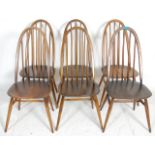 A set of six vintage dark elm sick back dining chairs having turned tapering legs with united by H