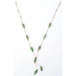 A 1930's Art Deco ladies Venetian necklace having green murano wedding cake glass beads with
