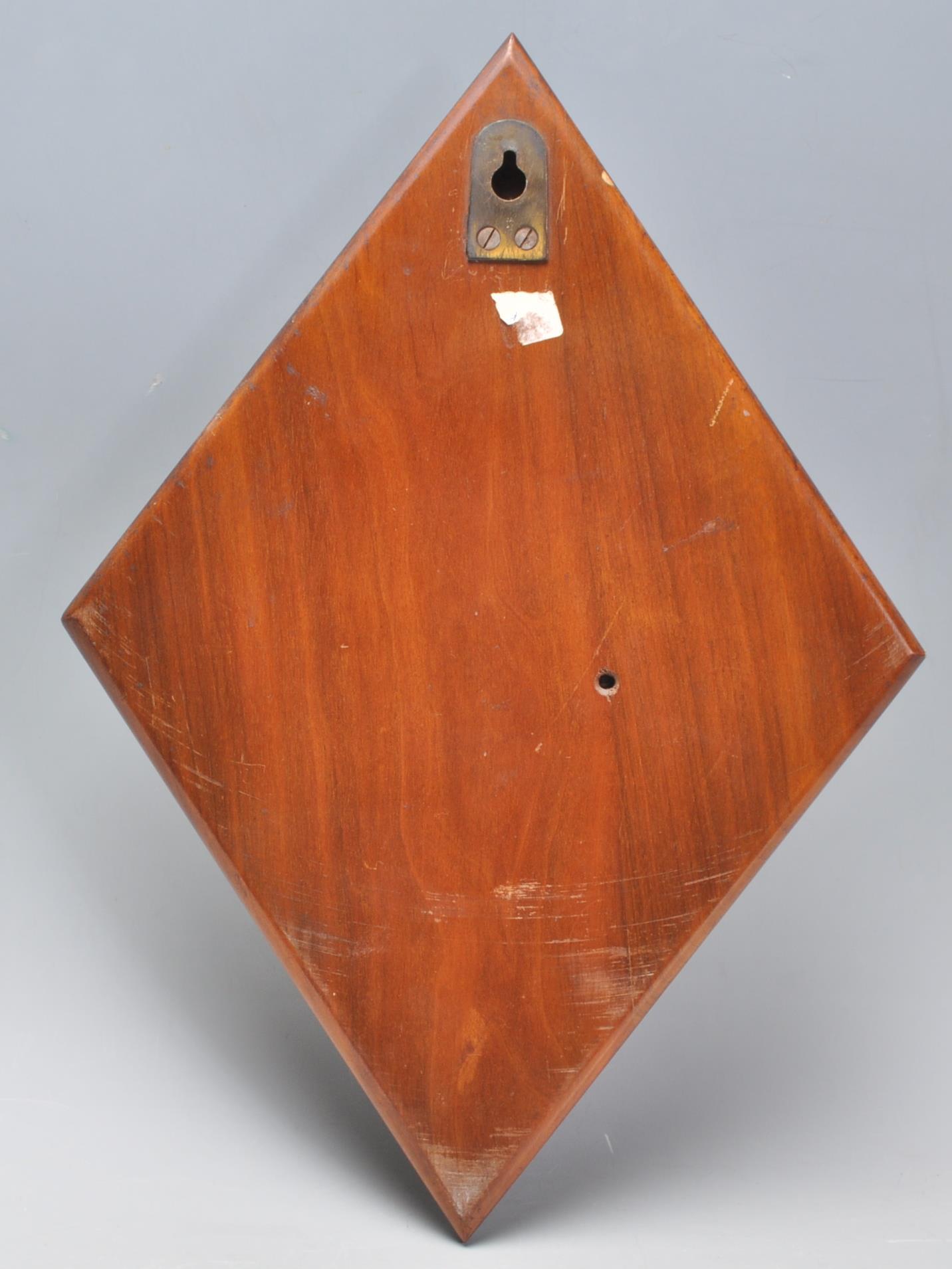 An early 20th Century carved oak barometer of lozenge shaped form having an enameled central round - Image 5 of 5