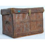 A 19th Century antique leather bound travelling trunk having stitched panelled decoration with