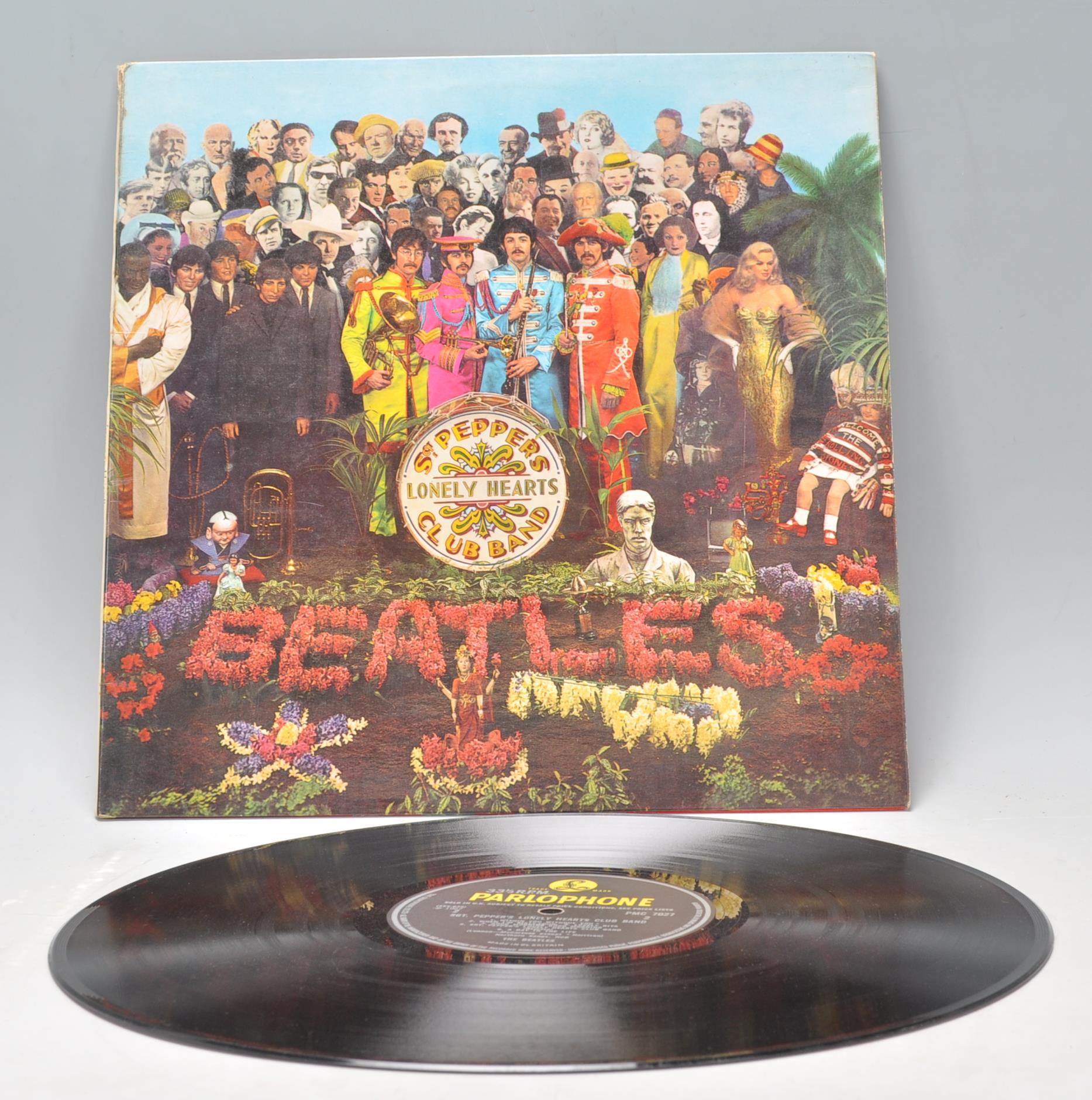 A vinyl long play LP record album by The Beatles – Sgt Pepper's Lonely Hearts Club Band – Original