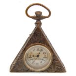 A brass cased Masonic style watch of triangular form having a central round face with symbols to the