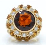 A French 18ct gold citrine and diamond sunflower r