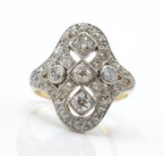 A 14ct gold and diamond panel ring. Estimated diam