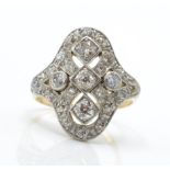 A 14ct gold and diamond panel ring. Estimated diam