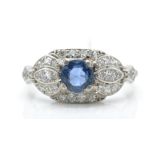 An 18ct white gold diamond and sapphire dome ring.