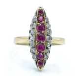A 14ct gold diamond and ruby navette ring.